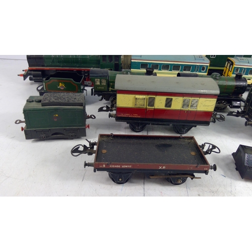 322 - Large selection of various carriages and rolling stock, mainly 0 gauge