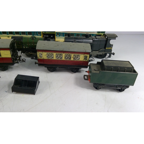 322 - Large selection of various carriages and rolling stock, mainly 0 gauge