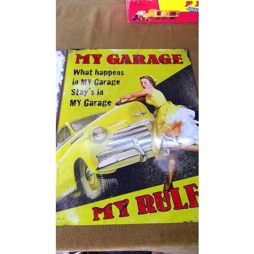 91 - 2 small tin novelty advertising signs, 40 x 30cms