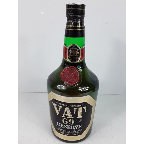 29 - Bottle of VAT 69 Reserve, 75cl, 40%, 1980's and a bottle of Passport Blended Scotch Whisky, 26 2/3fl... 