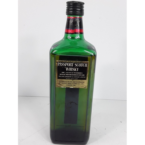 29 - Bottle of VAT 69 Reserve, 75cl, 40%, 1980's and a bottle of Passport Blended Scotch Whisky, 26 2/3fl... 