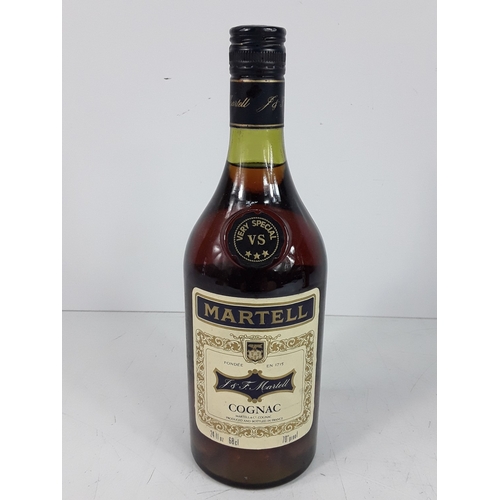 32 - Two bottles of Martell Three Stars Cognac, 24 fl.ozs, 70% proof, 1970's