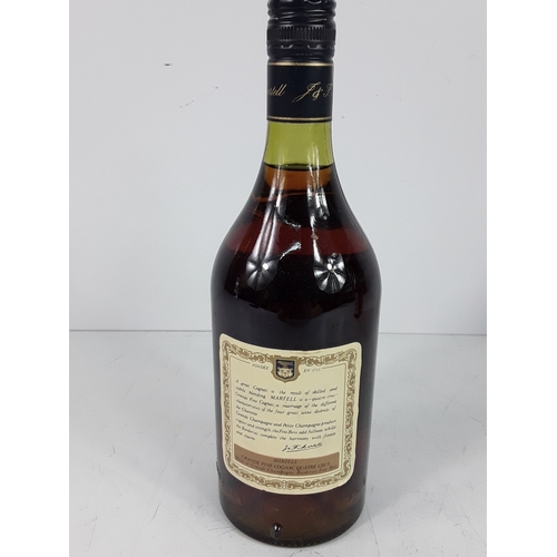 32 - Two bottles of Martell Three Stars Cognac, 24 fl.ozs, 70% proof, 1970's