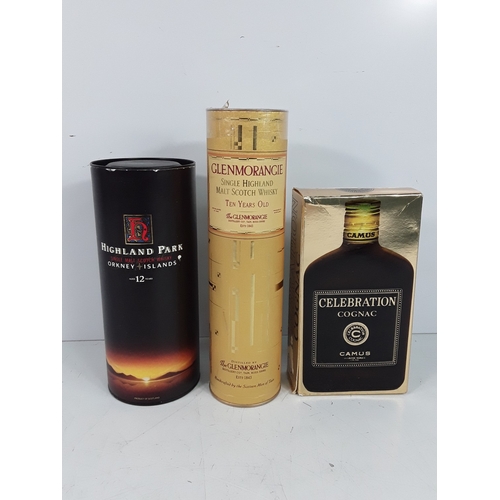 35 - Three bottle consisting of one boxed and sealed bottle of Glenmorangie 10 year old, 35cl, 40%, 1990'... 