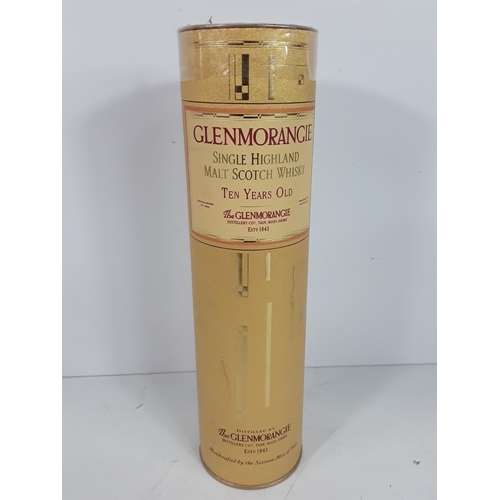 35 - Three bottle consisting of one boxed and sealed bottle of Glenmorangie 10 year old, 35cl, 40%, 1990'... 