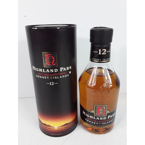 35 - Three bottle consisting of one boxed and sealed bottle of Glenmorangie 10 year old, 35cl, 40%, 1990'... 