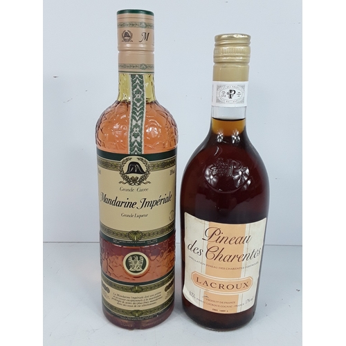 9 - Bottle of Grand Cuvee Mandarine Imperiale Liqueur, 700ml, 38% and a bottle of Pineau des Charentes L... 