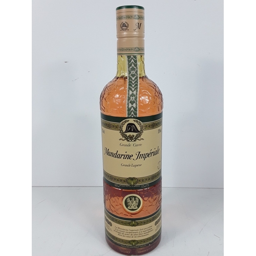 9 - Bottle of Grand Cuvee Mandarine Imperiale Liqueur, 700ml, 38% and a bottle of Pineau des Charentes L... 