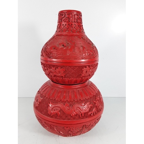 58 - Chinese cinnabar triple gourd vase, 31 x 20cms