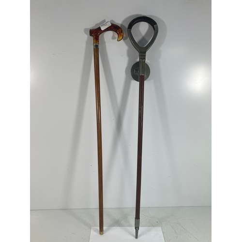 134 - Shooting stick, walking stick and a wooden cased banjo barometer