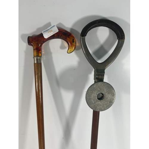 134 - Shooting stick, walking stick and a wooden cased banjo barometer