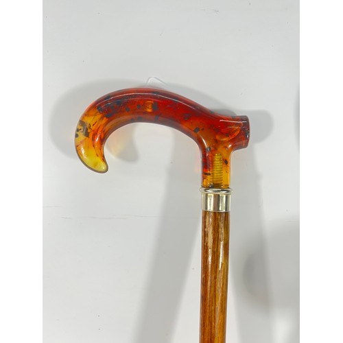 134 - Shooting stick, walking stick and a wooden cased banjo barometer