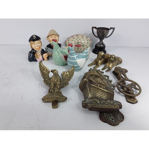 139 - Brass ware including door knockers, trophy, salt & pepper cruet sets and metal egg tin dated 1894