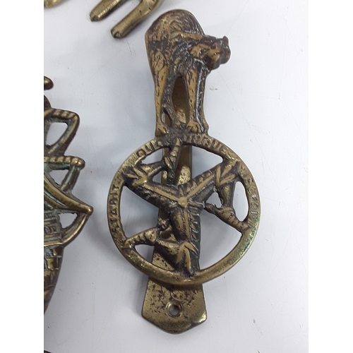 139 - Brass ware including door knockers, trophy, salt & pepper cruet sets and metal egg tin dated 1894