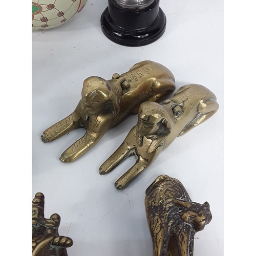 139 - Brass ware including door knockers, trophy, salt & pepper cruet sets and metal egg tin dated 1894