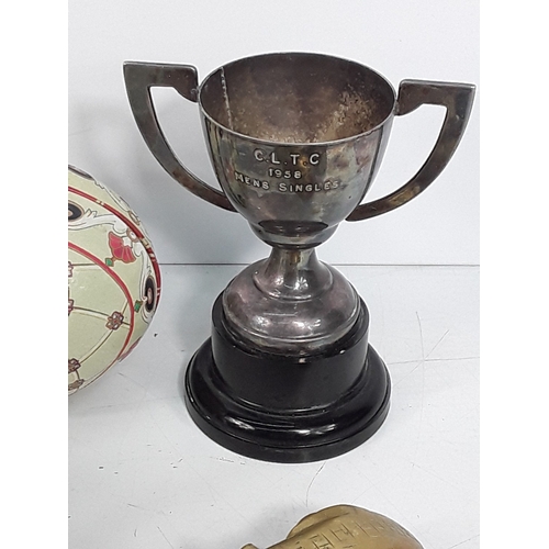 139 - Brass ware including door knockers, trophy, salt & pepper cruet sets and metal egg tin dated 1894