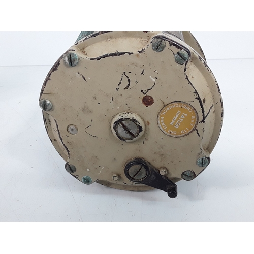 141 - Seven fishing reels, including Daiwa and Tatler