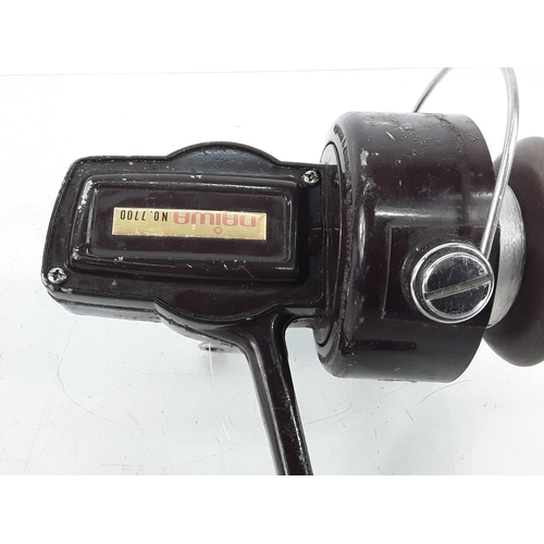 141 - Seven fishing reels, including Daiwa and Tatler