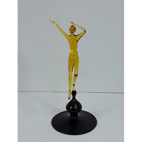 158 - Art glass dancing lady on dark glass base - probably Murano, 15cms in height