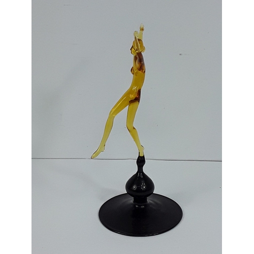 158 - Art glass dancing lady on dark glass base - probably Murano, 15cms in height
