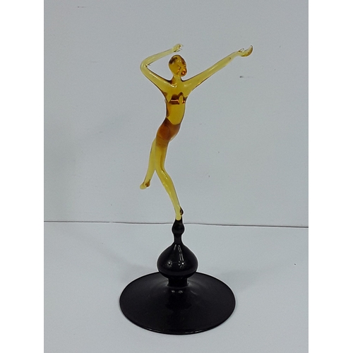 158 - Art glass dancing lady on dark glass base - probably Murano, 15cms in height