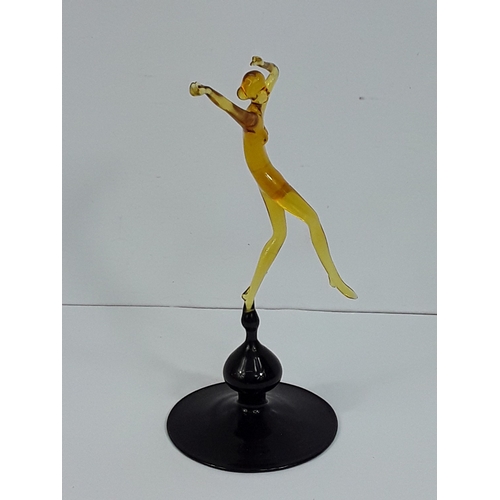 158 - Art glass dancing lady on dark glass base - probably Murano, 15cms in height