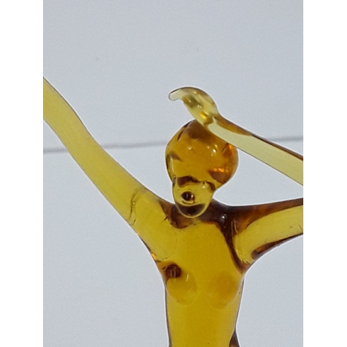 158 - Art glass dancing lady on dark glass base - probably Murano, 15cms in height