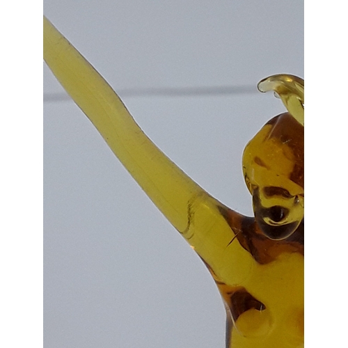 158 - Art glass dancing lady on dark glass base - probably Murano, 15cms in height