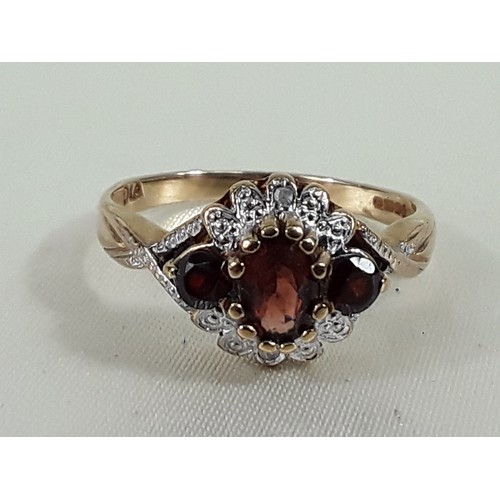 163 - 9ct gold garnet and diamond ring - Size O