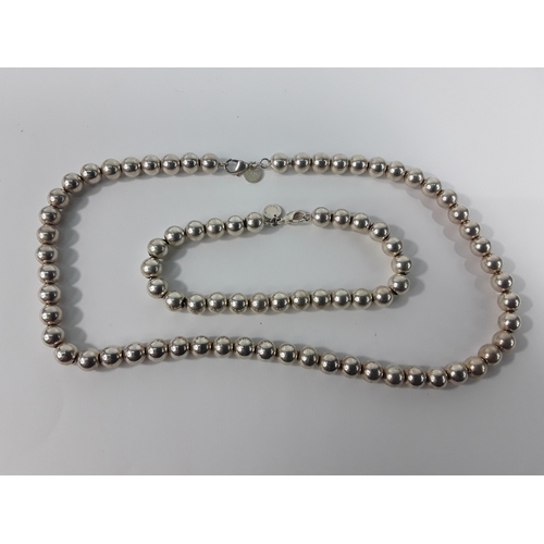 168 - Necklace and bracelet set marked Tiffany