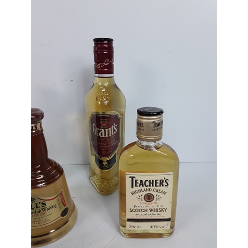 12 - Seven various bottles of whisky consisting of three Bell's, one 18, 75cl, one 20cl & one 37.5cl, bot... 