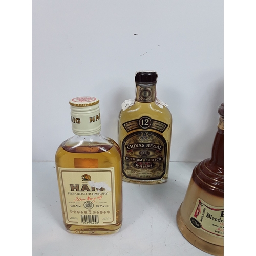 12 - Seven various bottles of whisky consisting of three Bell's, one 18, 75cl, one 20cl & one 37.5cl, bot... 