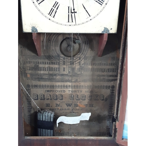 28 - Wooden cased American wall clock, complete