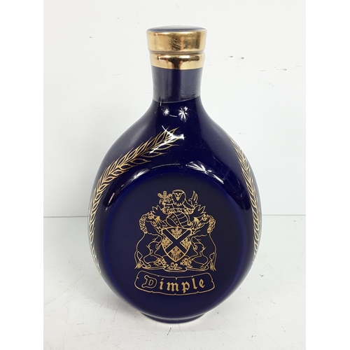 9 - Bottle of Dimple Blue Ceramic 12 years old, 75cl, 1980's and a bottle of Teachers, Highland Cream, 7... 
