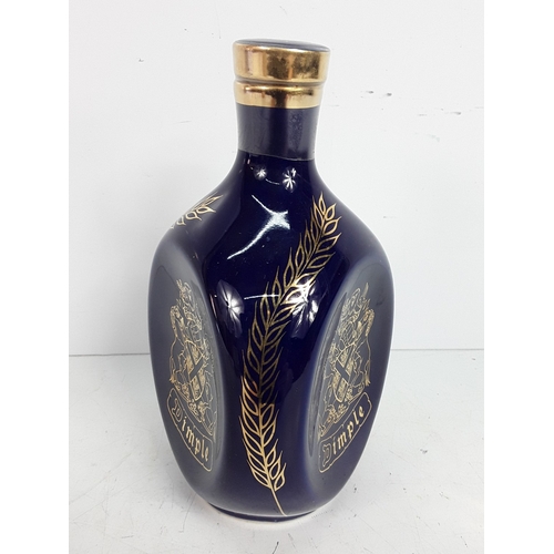 9 - Bottle of Dimple Blue Ceramic 12 years old, 75cl, 1980's and a bottle of Teachers, Highland Cream, 7... 