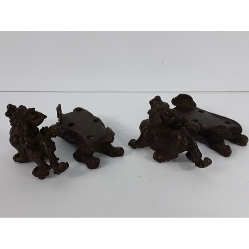25 - Pr of cast bronze Dogs of Fo on metal bases, 8 x 10 x 5cms