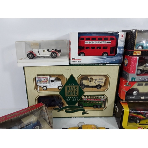 35 - Two boxes of model vehicles