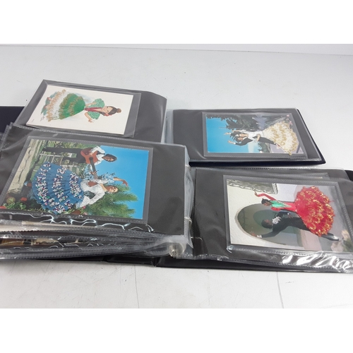 36 - Four albums of postcards