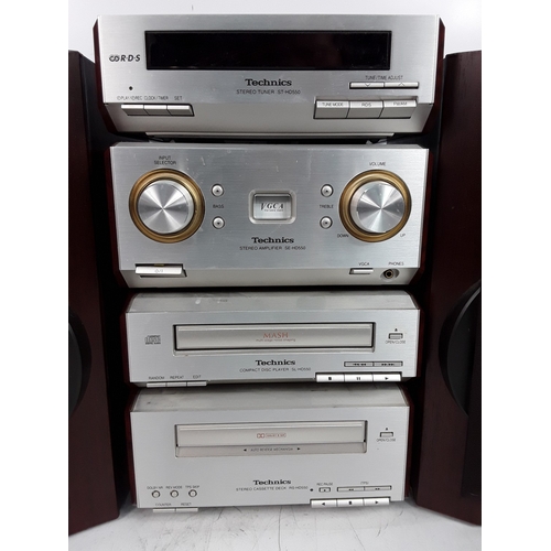 26 - Technics stacking stereo including tuner, CD player, Tape deck and amplifier