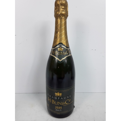 29 - Three bottles of Champagne, including Jacquart