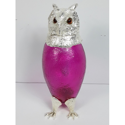 39 - Metal & glass claret jug in the form of an owl