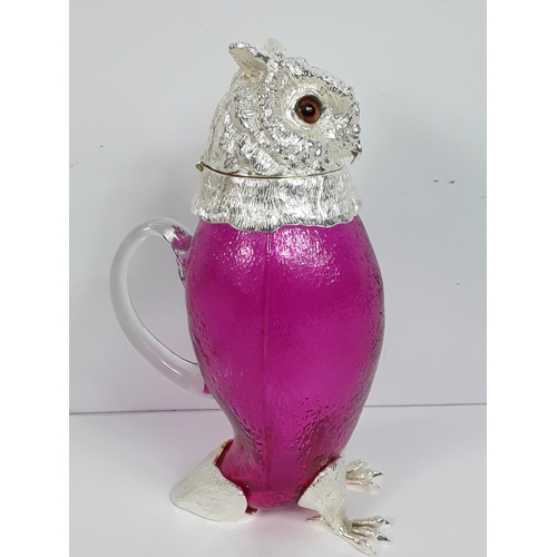 39 - Metal & glass claret jug in the form of an owl