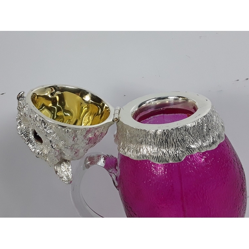 39 - Metal & glass claret jug in the form of an owl