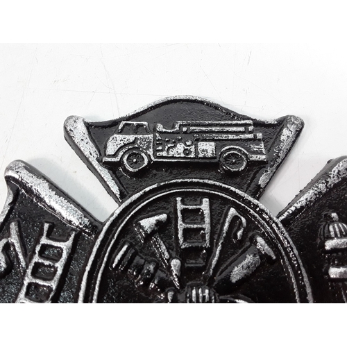 49 - Cast metal Fireman sign
