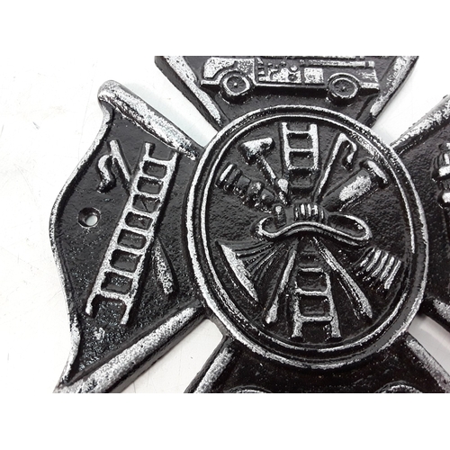 49 - Cast metal Fireman sign