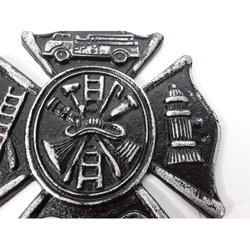49 - Cast metal Fireman sign