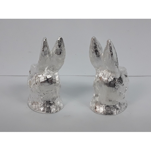55 - A pair of hare salt & pepper cruets