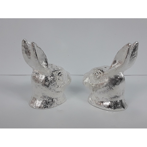 55 - A pair of hare salt & pepper cruets