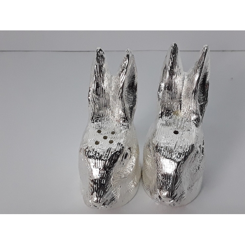 55 - A pair of hare salt & pepper cruets