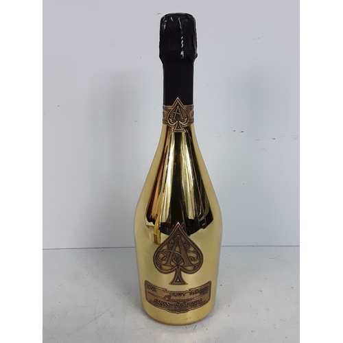 143 - Bottle of Armand De Brignac Ace of Spades champagne